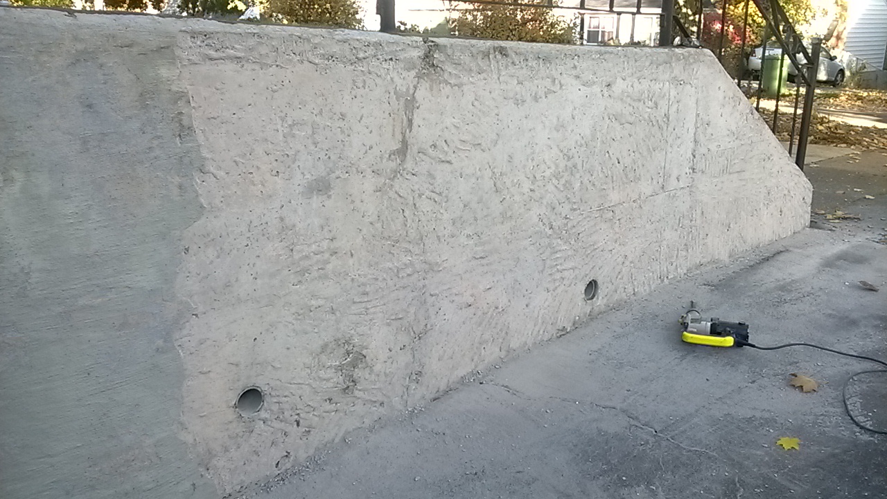 image of a concrete retaining wall-concrete retaining wall repair services completed in the Halifax by Pro Foundation Services based in Halifax, NS is providing their concrete retaining wall repair services covering all of the Halifax-Dartmouth Regional Municipality, Chester, Bridgewater, liverpool, Windsor, Wolfville, Kentville, Elmsdale, Truro, Musquodoboit Harbour & surrounding area.